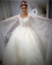 Load image into Gallery viewer, Glitter Tulle Ball Gown Wedding Dress With Cape
