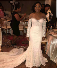 Load image into Gallery viewer, Skin Color Tulle Neck Long Sleeves Lace Mermaid Chapel Train Wedding Dresses