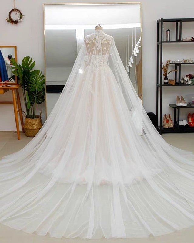 A-line appliques wedding dress with cape alinanova A-line appliques wedding dress with cape alinanova