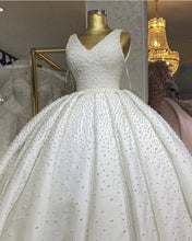 Load image into Gallery viewer, Luxury Pearl Beaded Wedding Dress V Neck Satin Ball Gown
