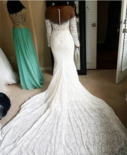 Load image into Gallery viewer, Skin Color Tulle Neck Long Sleeves Lace Mermaid Chapel Train Wedding Dresses
