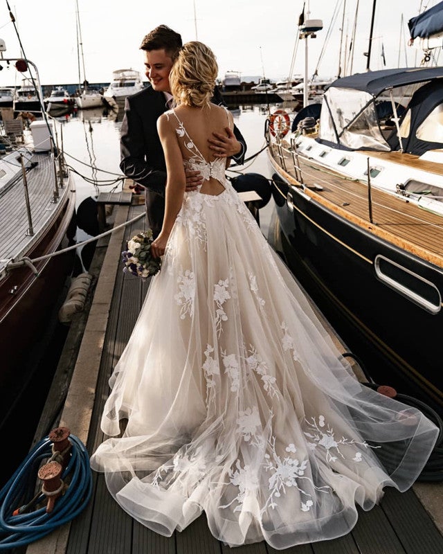 tulle backless dress Charming Long A-Line Spaghetti Straps Appliques Lace Tulle Backless Wedding Dress main image 0